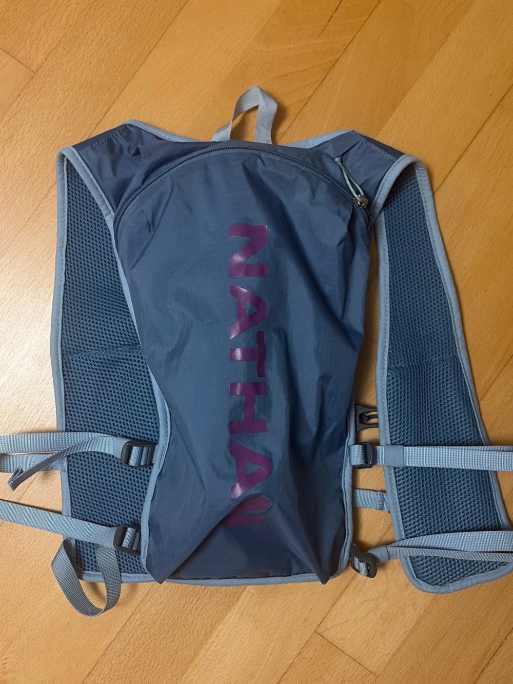 Nathan blue and purple hydration vest